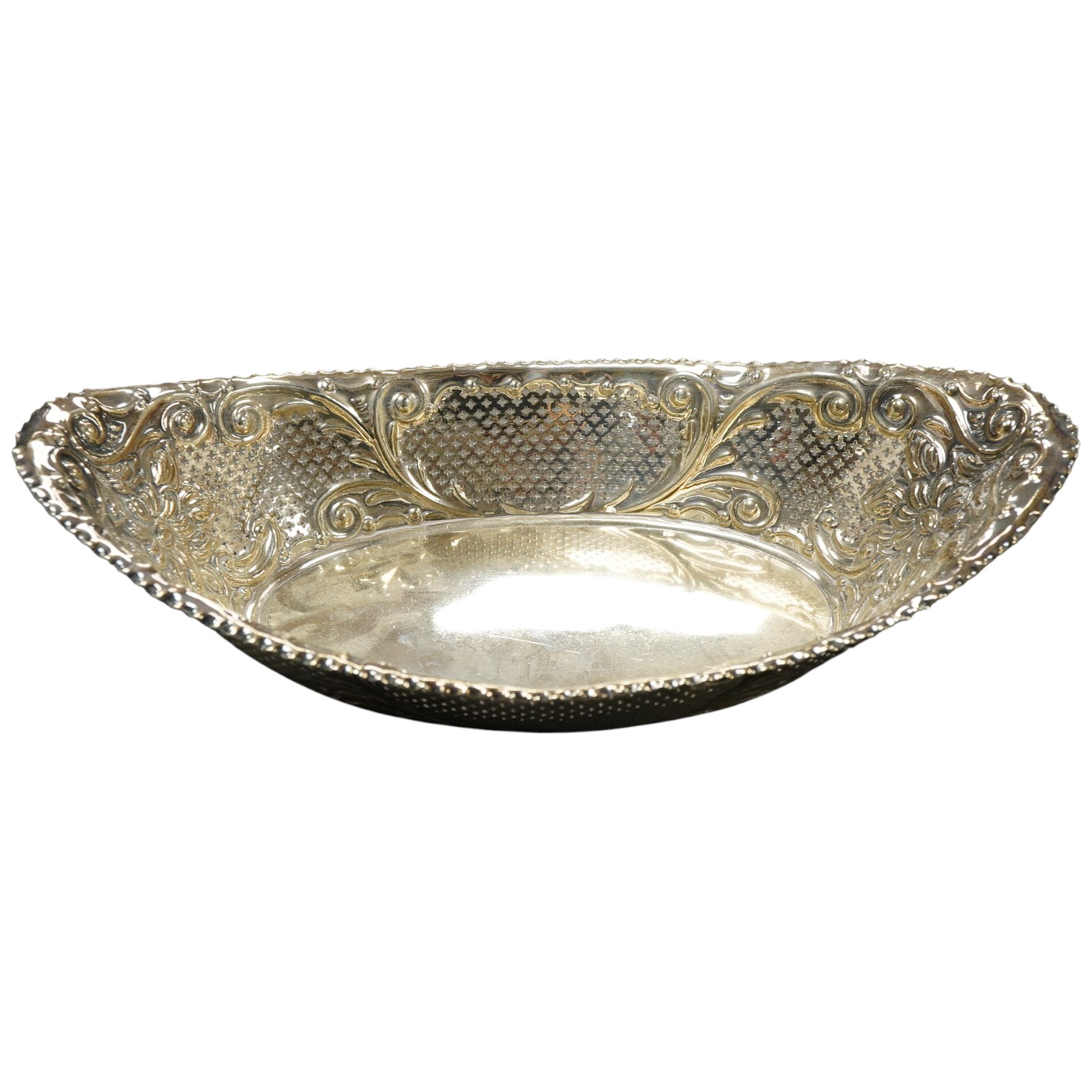 A late Victorian embossed silver oval fruit bowl, by James Dixon & Sons, Sheffield, 26.7cm, 9oz.